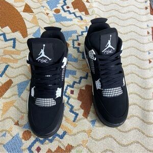 Jordan 4 White Thunder-Men’s Black and White Sneaker